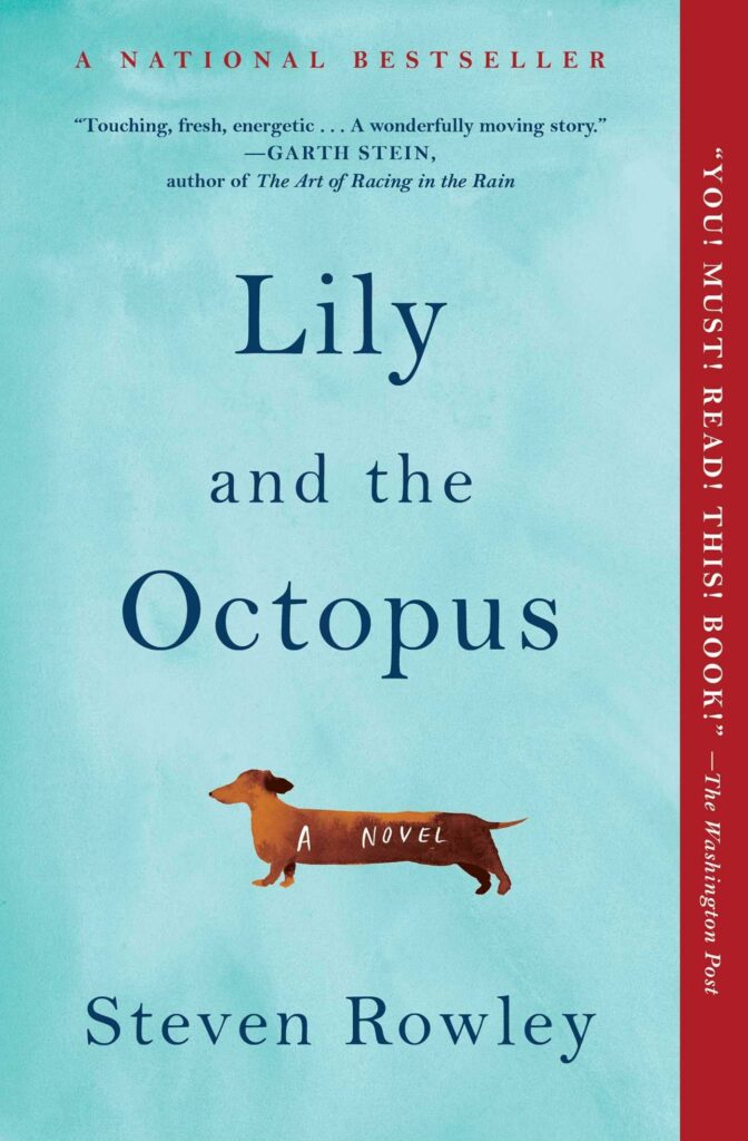 Book cover of Lily & The Octopus. The cover is light blue and has the words "Lily and the Octopus" in serif font. Below that is a little brown dachshund with "A novel" written in white on it. Below that is the author's name in dark blue.
