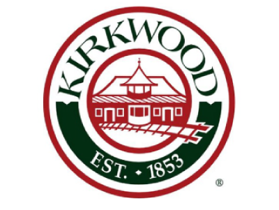 CityofKirkwood 1000 books before kindergarten logo - a plush teddy bear reading a book