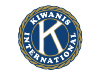 Kiwanis 1000 books before kindergarten logo - a plush teddy bear reading a book