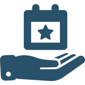 A hand holding a calendar with a star on it.