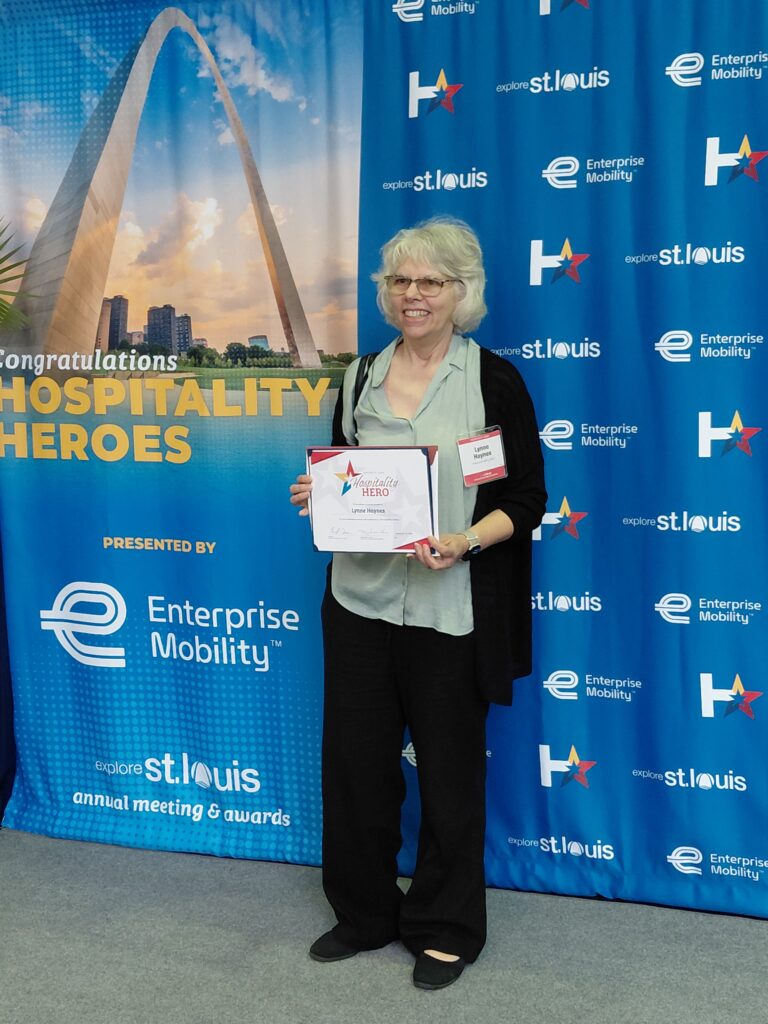 Lynne Haynes with her Hospitality Hero award at the reception.
